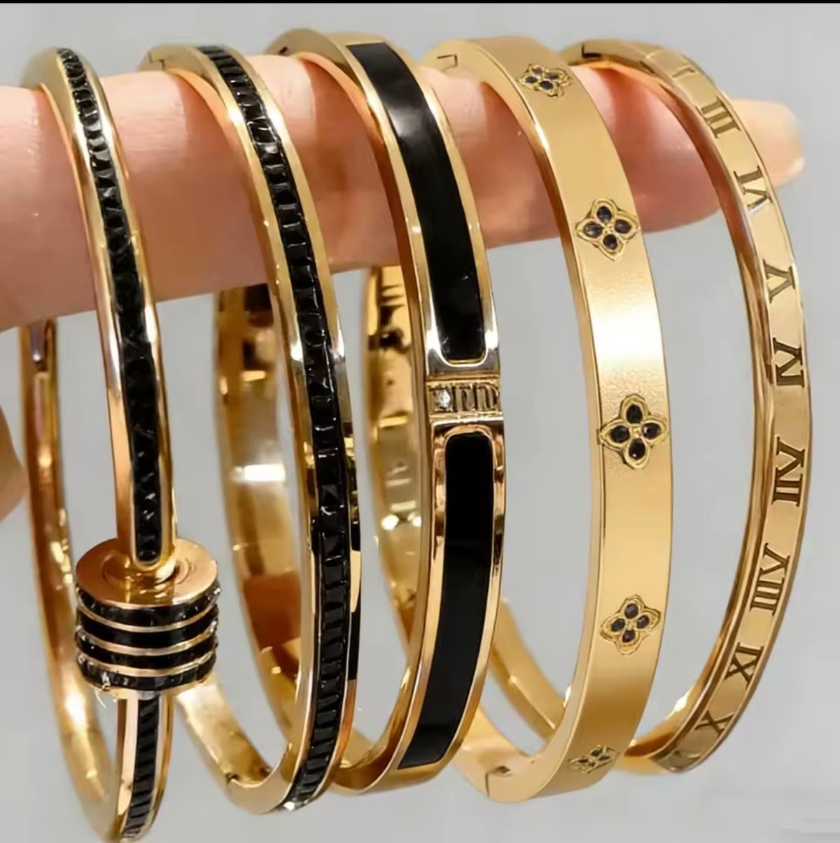 Black and gold designer-inspired stainless steel bracelet stack